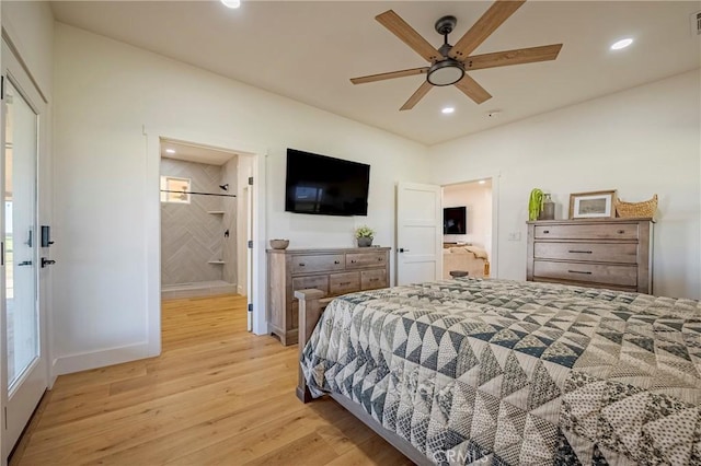 bedroom with ceiling fan, ensuite bathroom, and light hardwood / wood-style flooring