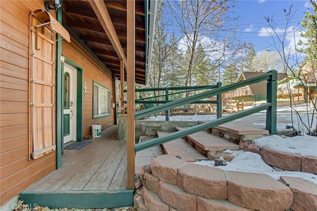 view of snow covered deck