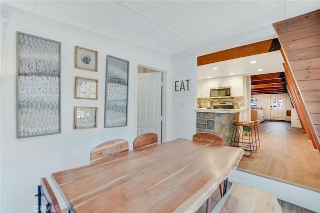 dining area featuring hardwood / wood-style flooring