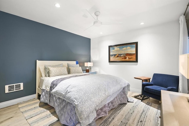 bedroom featuring ceiling fan and light wood-type flooring