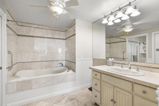 bathroom featuring vanity, ceiling fan, and tile patterned flooring