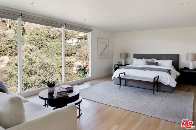 bedroom featuring hardwood / wood-style flooring