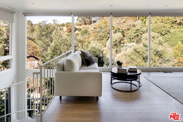 sunroom / solarium featuring a wealth of natural light