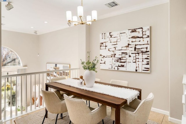 tiled dining area with ornamental molding, a wealth of natural light, and a notable chandelier