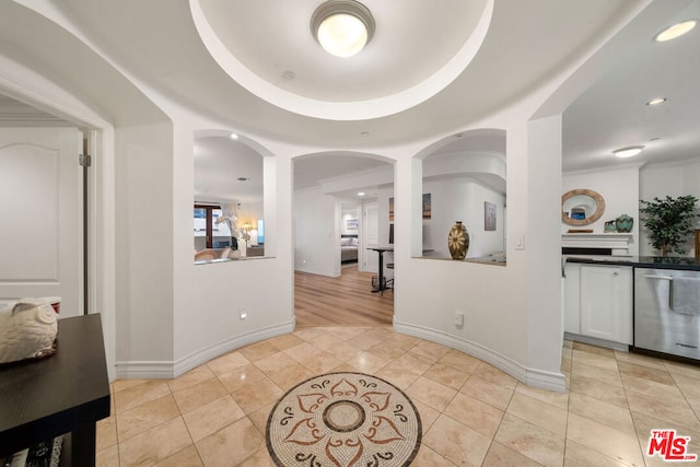 foyer entrance featuring light tile patterned floors