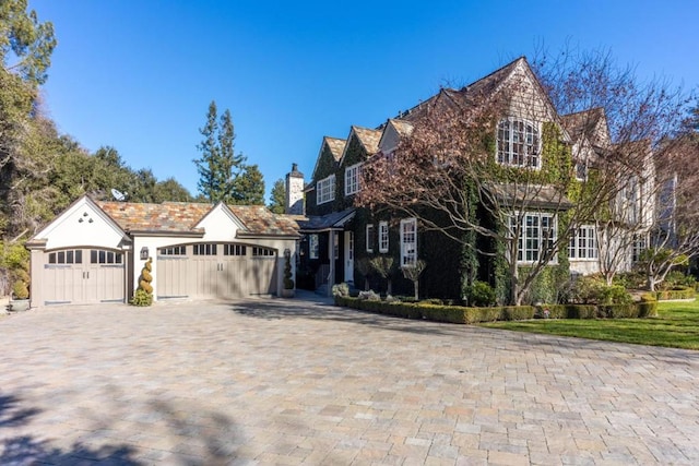 view of front of property featuring a garage