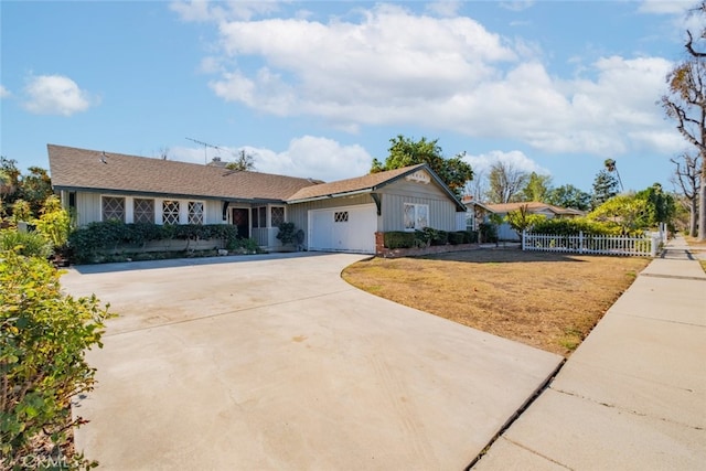 single story home featuring a garage