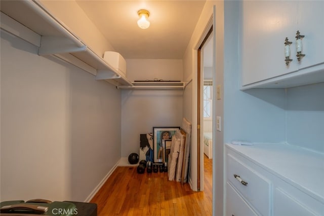 walk in closet featuring light wood-type flooring