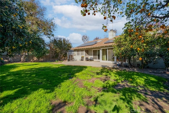 view of yard with a patio area