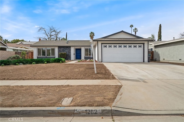 ranch-style home with a garage