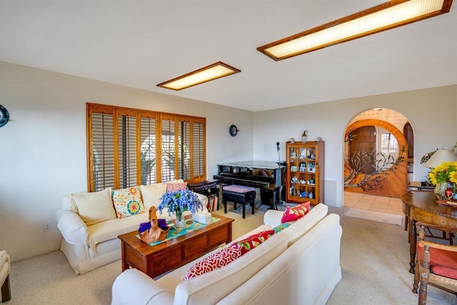 living room featuring light carpet