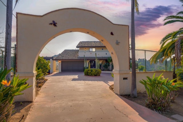 view of front of property with a garage