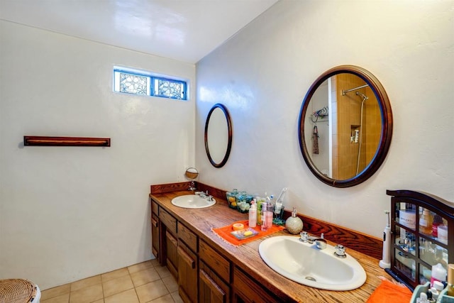 bathroom featuring tile patterned floors and vanity