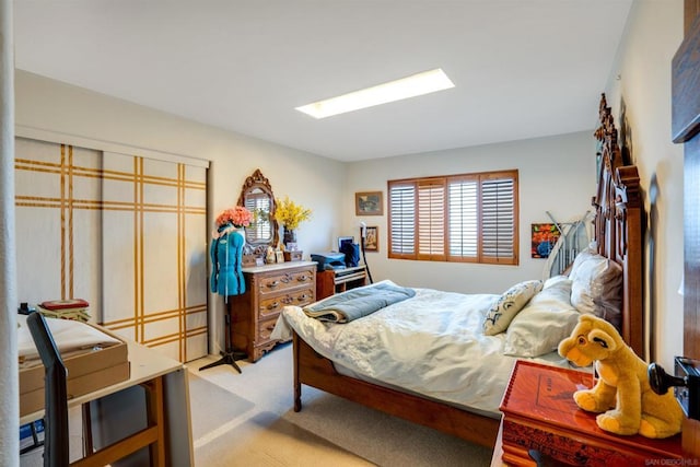 bedroom with light carpet