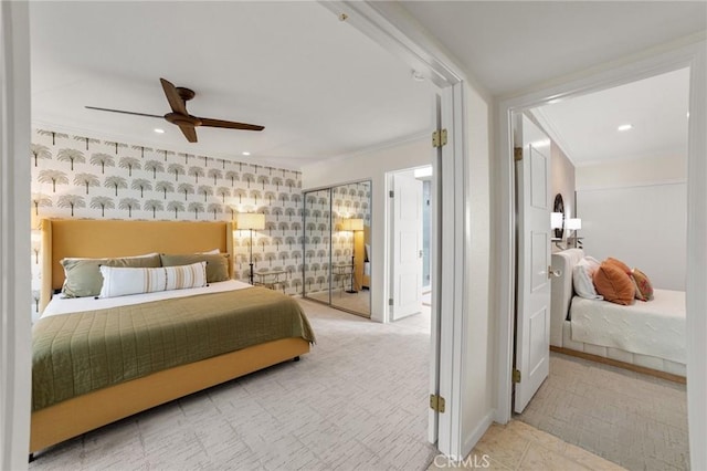 bedroom with crown molding and ceiling fan