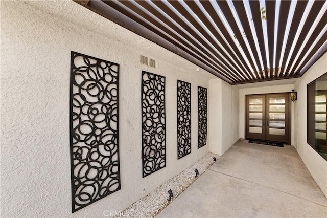 view of exterior entry with french doors