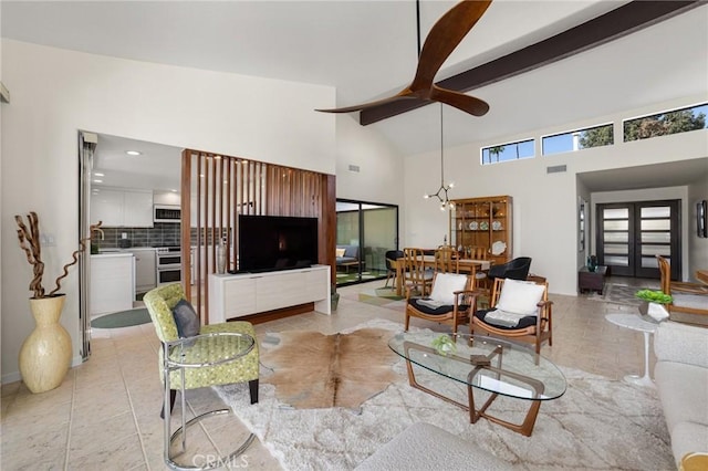 living room featuring sink, ceiling fan, high vaulted ceiling, and beam ceiling