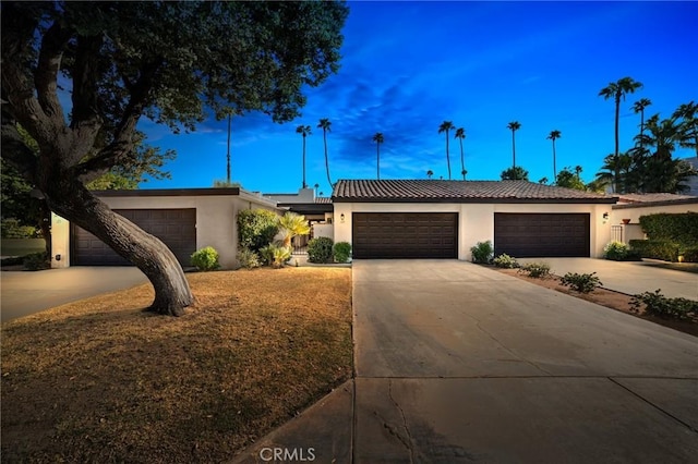 single story home with a garage