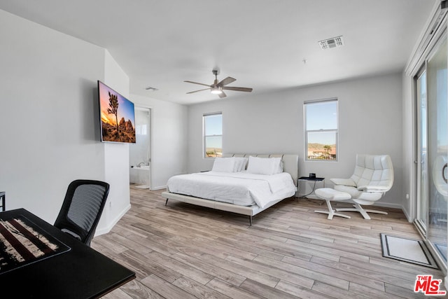 bedroom with ceiling fan and light hardwood / wood-style floors