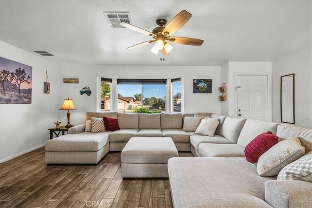 living room featuring ceiling fan