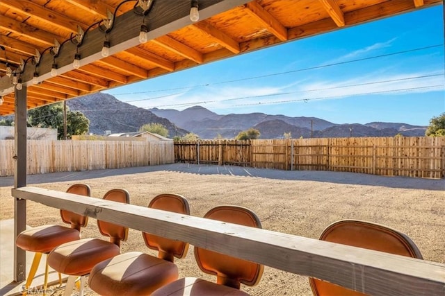 view of yard with a mountain view