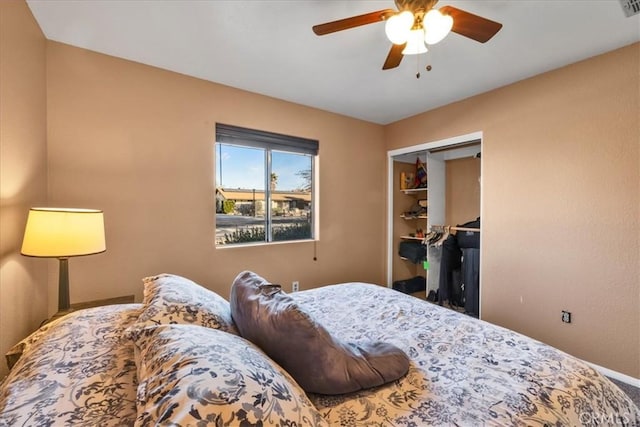 bedroom with ceiling fan and a closet