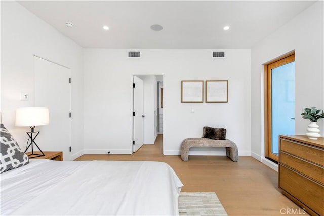 2456 Loy Ln, Los Angeles, CA 90041 - bedroom with baseboards, visible vents, and light wood-style flooring