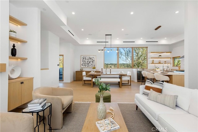 2456 Loy Ln, Los Angeles, CA 90041 - living area with recessed lighting, wine cooler, light wood-type flooring, a tray ceiling, and visible vents
