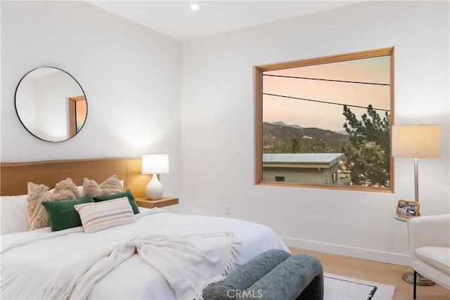 bedroom with light wood-type flooring