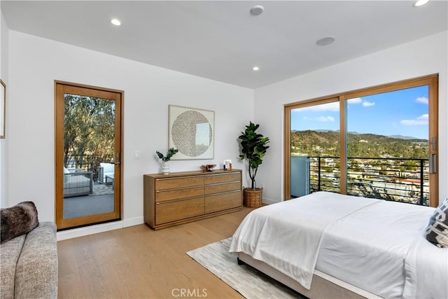 2456 Loy Ln, Los Angeles, CA 90041 - bedroom featuring light wood finished floors, recessed lighting, access to outside, and baseboards