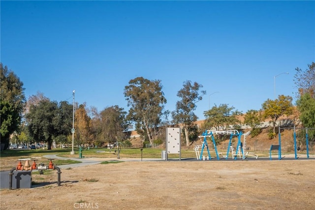 surrounding community featuring a playground