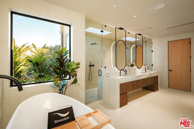 bathroom featuring vanity and plus walk in shower