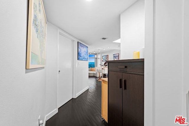 hall featuring dark hardwood / wood-style floors