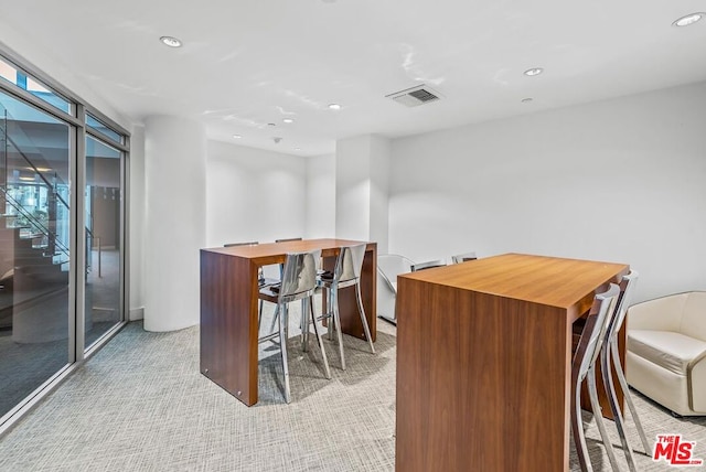 interior space featuring floor to ceiling windows