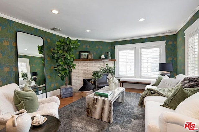 living room featuring ornamental molding, plenty of natural light, and dark wood-type flooring