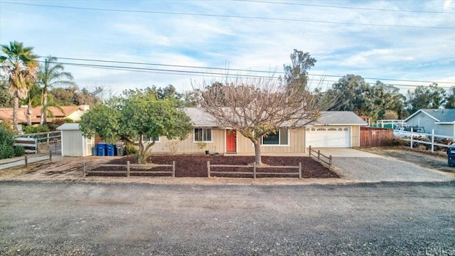 ranch-style house featuring a garage