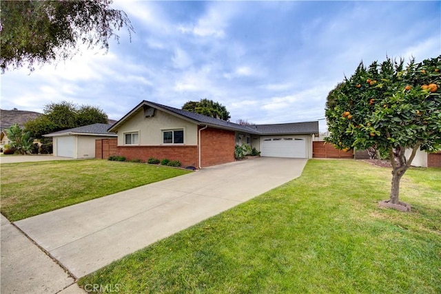 ranch-style home with a garage and a front lawn