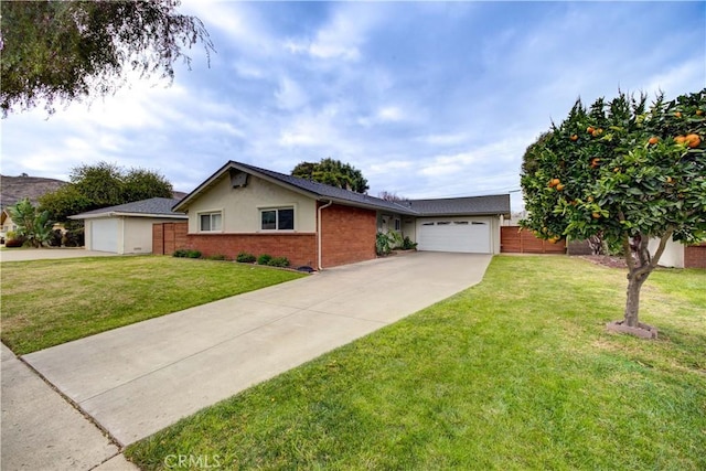 ranch-style home featuring a garage and a front lawn