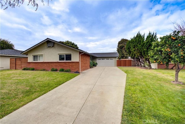 single story home with a garage and a front lawn