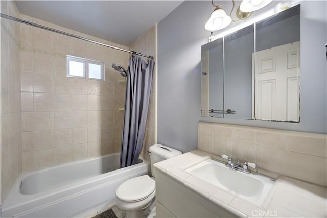 full bathroom with shower / tub combo, backsplash, vanity, and toilet