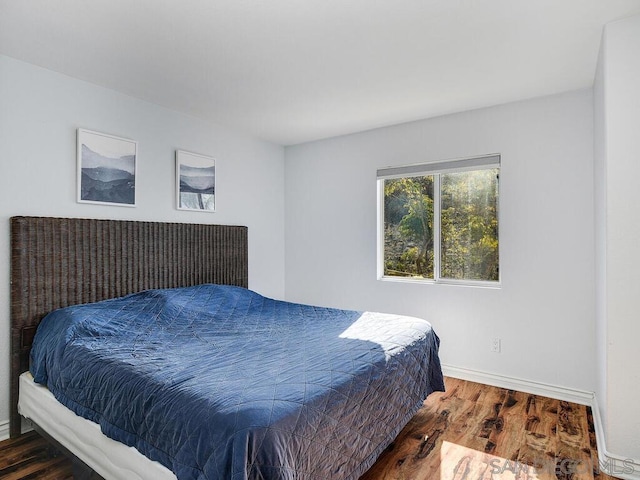 bedroom featuring dark hardwood / wood-style floors