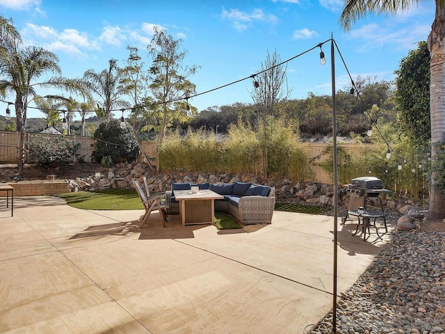 view of patio / terrace featuring an outdoor hangout area and grilling area