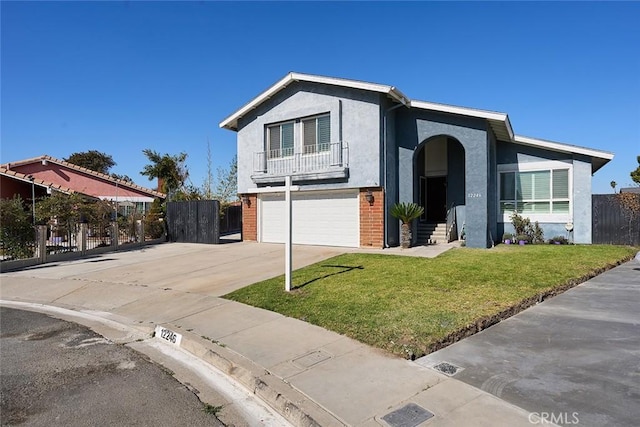 view of front of home featuring a garage and a front lawn