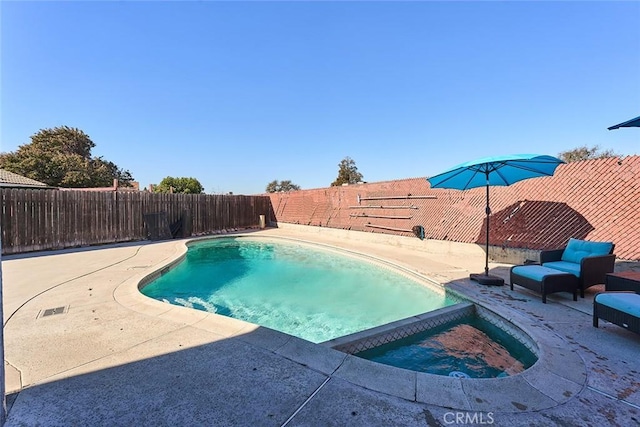 view of pool with a patio