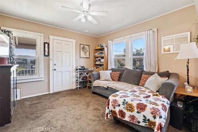 living room with ceiling fan and carpet floors