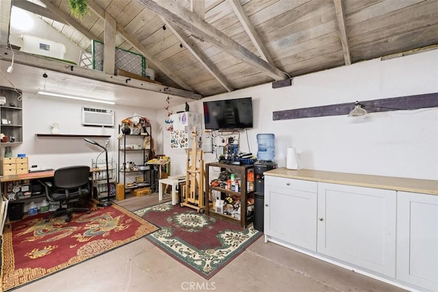 interior space featuring wood ceiling, lofted ceiling with beams, and a wall unit AC