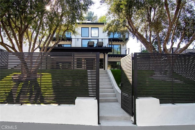 exterior space featuring a balcony