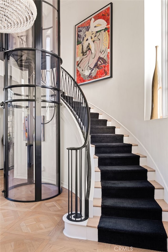 stairway with parquet floors