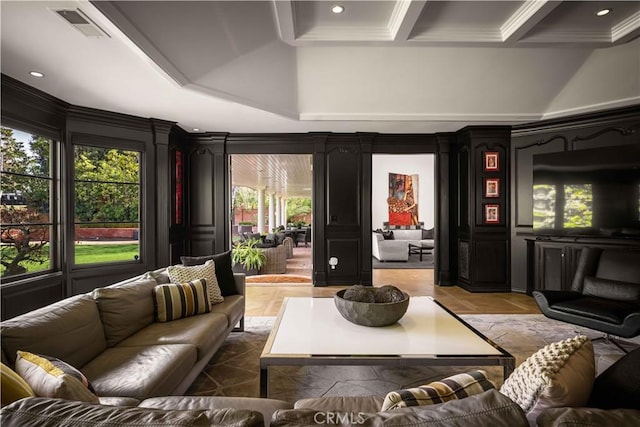 living room with visible vents, recessed lighting, crown molding, and a high ceiling