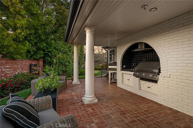 view of patio featuring grilling area and an outdoor kitchen